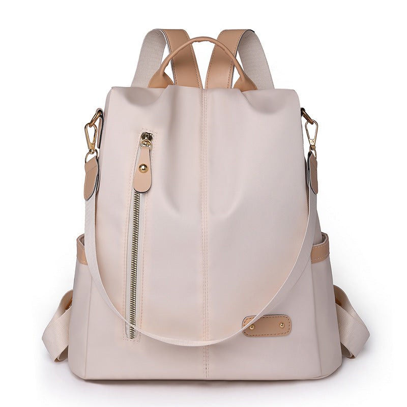 KAMAMES 2025 popular new women's leisure anti-theft backpack fashion contrasting nylon rivets travel backpack schoolbag delivery