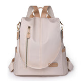 KAMAMES 2025 popular new women's leisure anti-theft backpack fashion contrasting nylon rivets travel backpack schoolbag delivery