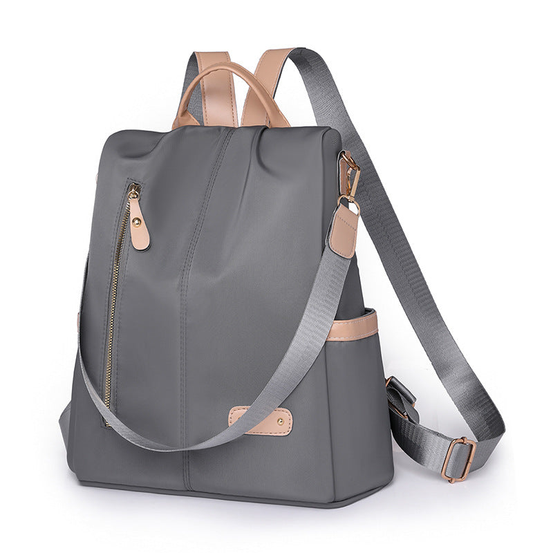KAMAMES 2025 popular new women's leisure anti-theft backpack fashion contrasting nylon rivets travel backpack schoolbag delivery