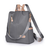 KAMAMES 2025 popular new women's leisure anti-theft backpack fashion contrasting nylon rivets travel backpack schoolbag delivery