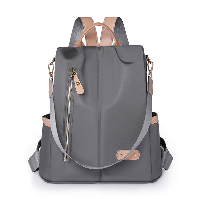 KAMAMES 2025 popular new women's leisure anti-theft backpack fashion contrasting nylon rivets travel backpack schoolbag delivery