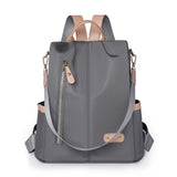 KAMAMES 2025 popular new women's leisure anti-theft backpack fashion contrasting nylon rivets travel backpack schoolbag delivery