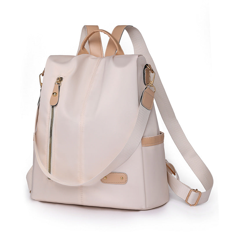 KAMAMES 2025 popular new women's leisure anti-theft backpack fashion contrasting nylon rivets travel backpack schoolbag delivery