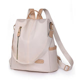 KAMAMES 2025 popular new women's leisure anti-theft backpack fashion contrasting nylon rivets travel backpack schoolbag delivery