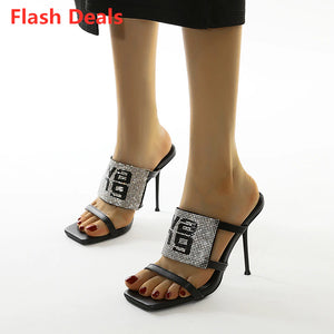 kamames Sandals Women 2022 Luxury Brand Letter Fashion Summer Sexy Crystal Rhinestone High Heels Stiletto Wedding Shoes Woman Slippers