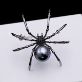 2025 New Korean fashion personality black spider zircon brooch women's breast flower girl gift men's and women's accessories wholesale