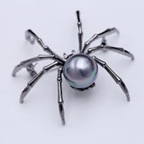 2025 New Korean fashion personality black spider zircon brooch women's breast flower girl gift men's and women's accessories wholesale