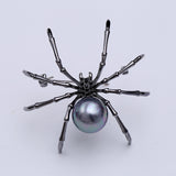 2025 New Korean fashion personality black spider zircon brooch women's breast flower girl gift men's and women's accessories wholesale