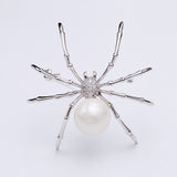 2025 New Korean fashion personality black spider zircon brooch women's breast flower girl gift men's and women's accessories wholesale