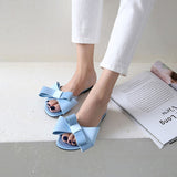 Wearing flat slippers women's shoes 2019 Korean version of the summer new large bow satin round head sandals Wild half slippers