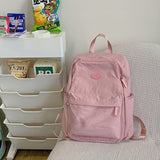 2025 Korean version of simple and versatile ins wind backpack female junior high school students large-capacity campus wind casual backpack