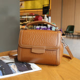women's bags, genuine leather portable small square bags, fashionable atmosphere, first layer cowhide bubble pattern messenger shoulder bag tide 5567