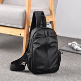 2025 New leather film men's messenger bag simple fashion trend shoulder bag casual versatile high sense commuter breast bag
