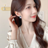 2025 Fashion OL cute micro-inlaid zircon panda pearl earrings s925 silver needle niche high-end light luxury stud earrings accessories women
