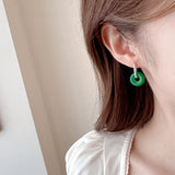 2025 New Chinese retro stud earrings, chalcedony green buckle earrings, niche light luxury, explosive temperament, fashionable and versatile earrings.