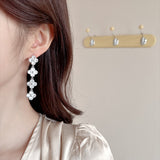 2025 High-end light luxury temperament lucky grass earrings s925 silver needle long tassel zircon fashion commuter flower stud earrings