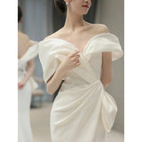 One-word shoulder white  dress 2025 new winter light luxury niche high-end engagement fishtail high-end evening dress