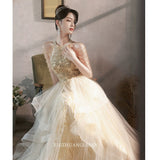 Champagne evening dress female banquet temperament haute couture fringed host high sense light luxury niche high-end performance skirt