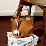 KAMAMES 2025 popular summer new fashion leather bucket bag niche first layer cowhide retro single shoulder diagonal span portable vegetable basket bag