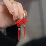 Red Chinese knot tassel ear buckle festive wedding earrings high-end concentric knot New Year's earrings cheongsam hanfu earrings
