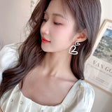 2025 Light luxury high-end love earrings Celebrity temperament inlaid hollow heart-shaped high-end S925 silver needle fashion earrings