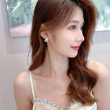 2025 new  niche Korean temperament Internet celebrity earrings s925 silver needle natural mother shell triangular earrings