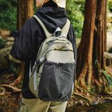 2025 Japanese new large-capacity and lightweight men's and women's same contrasting color backpack high-value casual versatile travel backpack