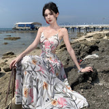 2025 romantic printed suspender dress for women's summer new temperament waist and thin V-neck seaside vacation dress