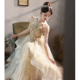 Champagne evening dress female banquet temperament haute couture fringed host high sense light luxury niche high-end performance skirt