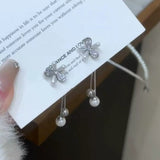 New niche zircon flower fringed stud earrings, sterling silver needle earrings, light luxury long fringed earrings, split earrings.