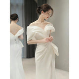 One-word shoulder white  dress 2025 new winter light luxury niche high-end engagement fishtail high-end evening dress