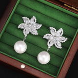 2025 high-end flower earrings super flash zircon windmill pearl earrings silver needle versatile creative bride earrings women