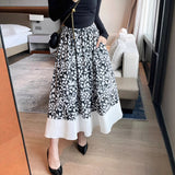 2025 Retro cotton printed skirt women's spring and autumn pear-shaped figure is thin, elastic waist temperament umbrella skirt