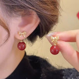 New Year's Earrings Red Pearl Bow Earrings 925 Silver Needle Concentric Knot Festive Chinese Knot Long Earrings