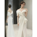 One-word shoulder white  dress 2025 new winter light luxury niche high-end engagement fishtail high-end evening dress