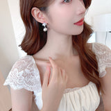 2025 gentle temperament sweet zircon flower pearl earrings fashion versatile high sense niche light luxury stud earrings women
