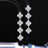 2025 High-end light luxury temperament lucky grass earrings s925 silver needle long tassel zircon fashion commuter flower stud earrings