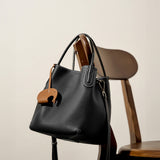 KAMAMES 2025 popular summer new fashion leather bucket bag niche first layer cowhide retro single shoulder diagonal span portable vegetable basket bag