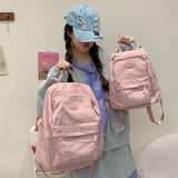 2025 Korean version of simple and versatile ins wind backpack female junior high school students large-capacity campus wind casual backpack