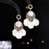2025 Retro exaggerated temperament shell long fringed earrings women's high sense atmospheric fashion earrings live broadcast popular earrings