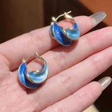 Retro sky blue enamel colored ear buckle fashionable Chinese style spiral blue earrings light luxury white earrings