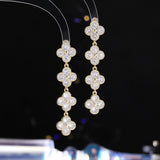 2025 High-end light luxury temperament lucky grass earrings s925 silver needle long tassel zircon fashion commuter flower stud earrings