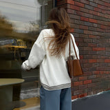 2025 New color contrasting collar letter lazy wind sweater trendy brand design sense contrasting color autumn and winter sweater women's wholesale customization