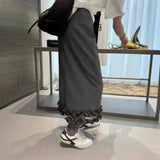 2025 spring Korean version fashionable versatile high waist rear split ruffle edge skirt medium and long temperament skirt women