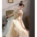 Champagne evening dress female banquet temperament haute couture fringed host high sense light luxury niche high-end performance skirt