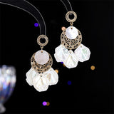 2025 Retro exaggerated temperament shell long fringed earrings women's high sense atmospheric fashion earrings live broadcast popular earrings