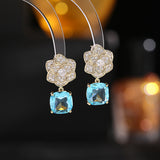 2025 Douyin's explosive new trendy camellia zircon earrings for women's high-end green crystal temperament light luxury earrings for women