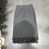 2025 spring Korean version fashionable versatile high waist rear split ruffle edge skirt medium and long temperament skirt women