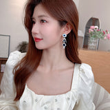 2025 Retro court gem water drop fringed flower earrings long design sense  heavy industry high-end luxury earrings