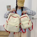 2025 Korean version of simple and versatile ins wind backpack female junior high school students large-capacity campus wind casual backpack